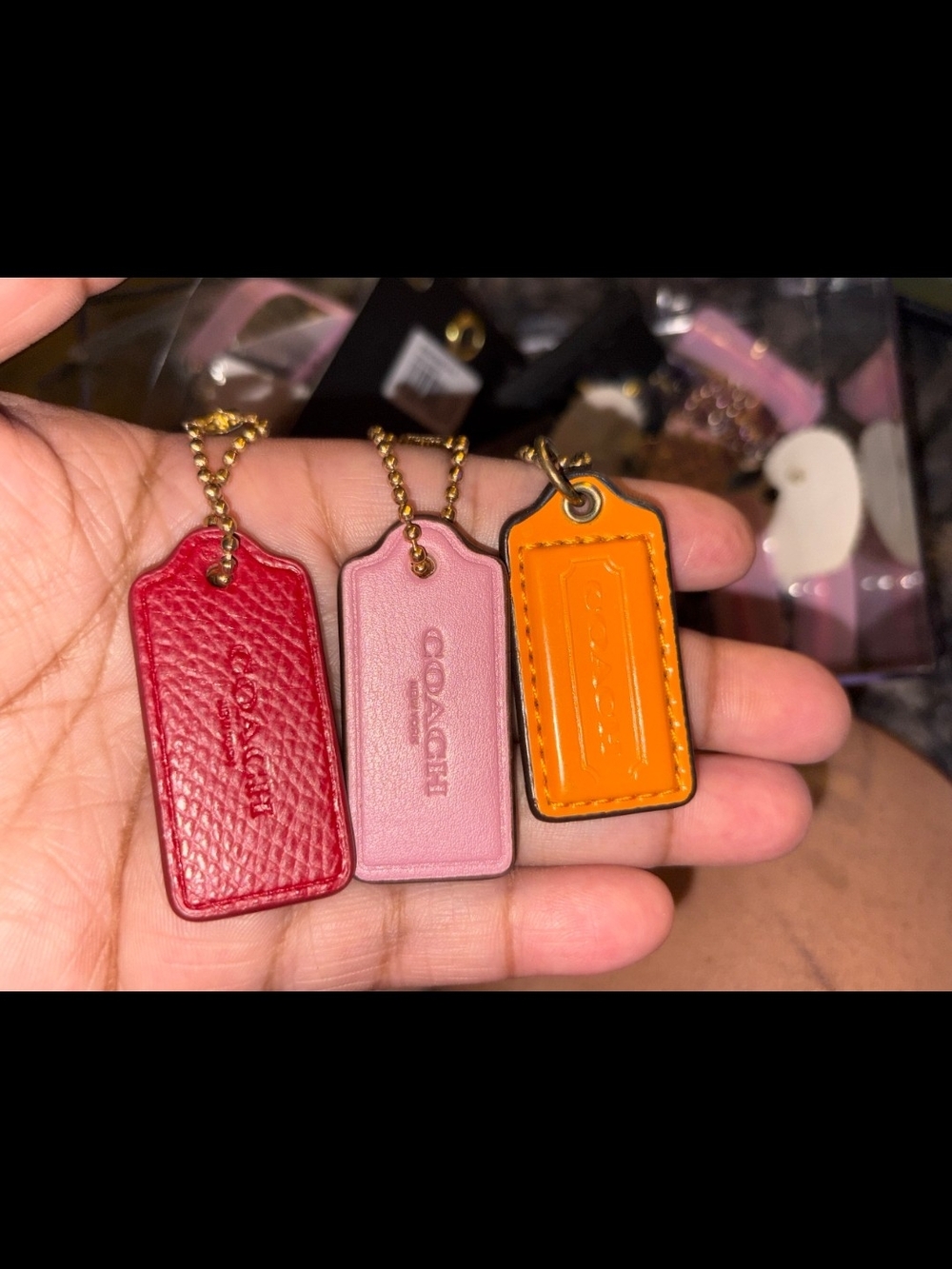Coach Leather Tag Keychain Trio in Red, Pink & Orange